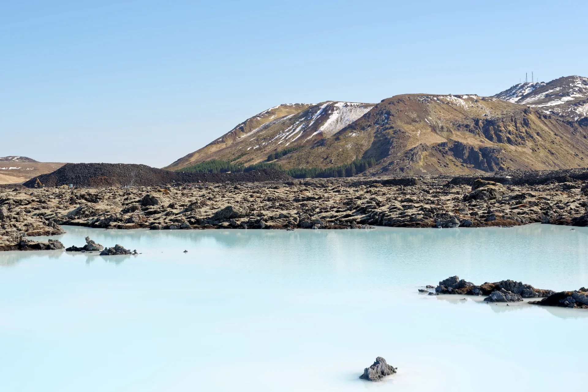 Milky-blue waters near the Blue Lagoon, lava rocks and Mount Þorbjörn, on April 30, 2023.