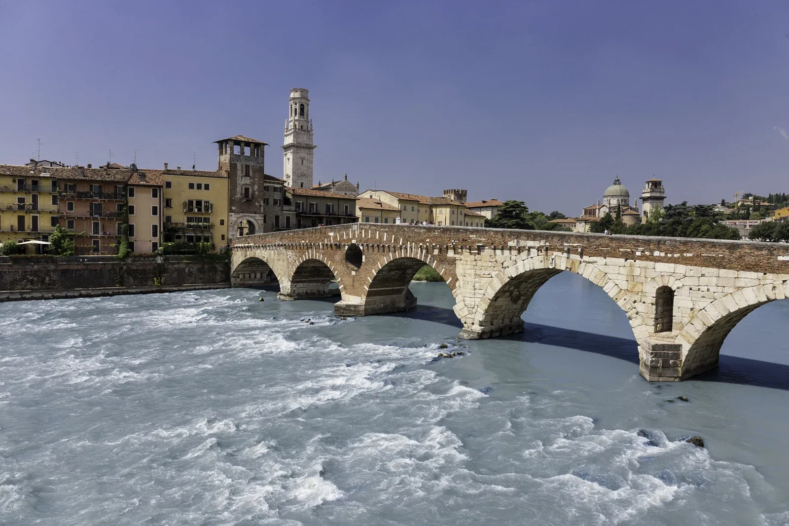 The arches of Ponte Pietra over the Adige River in Verona.